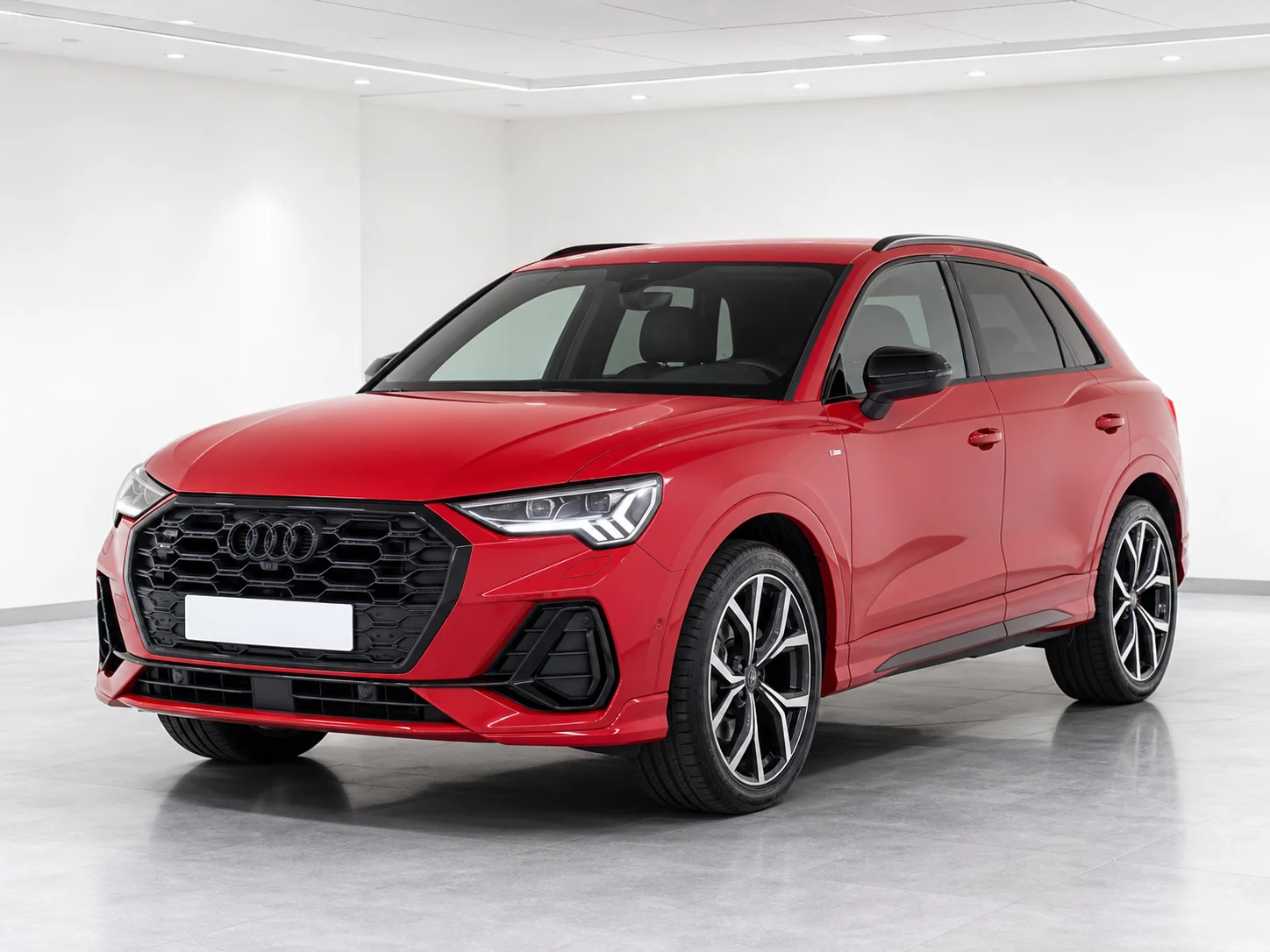 2026 Audi Q3 45 TFSI e S line S tronic in a white LED showroom