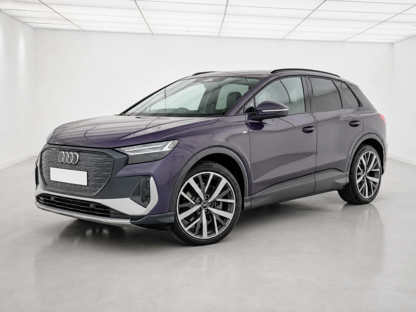 2026 Audi Q4 e-tron 45 S line in a white LED showroom