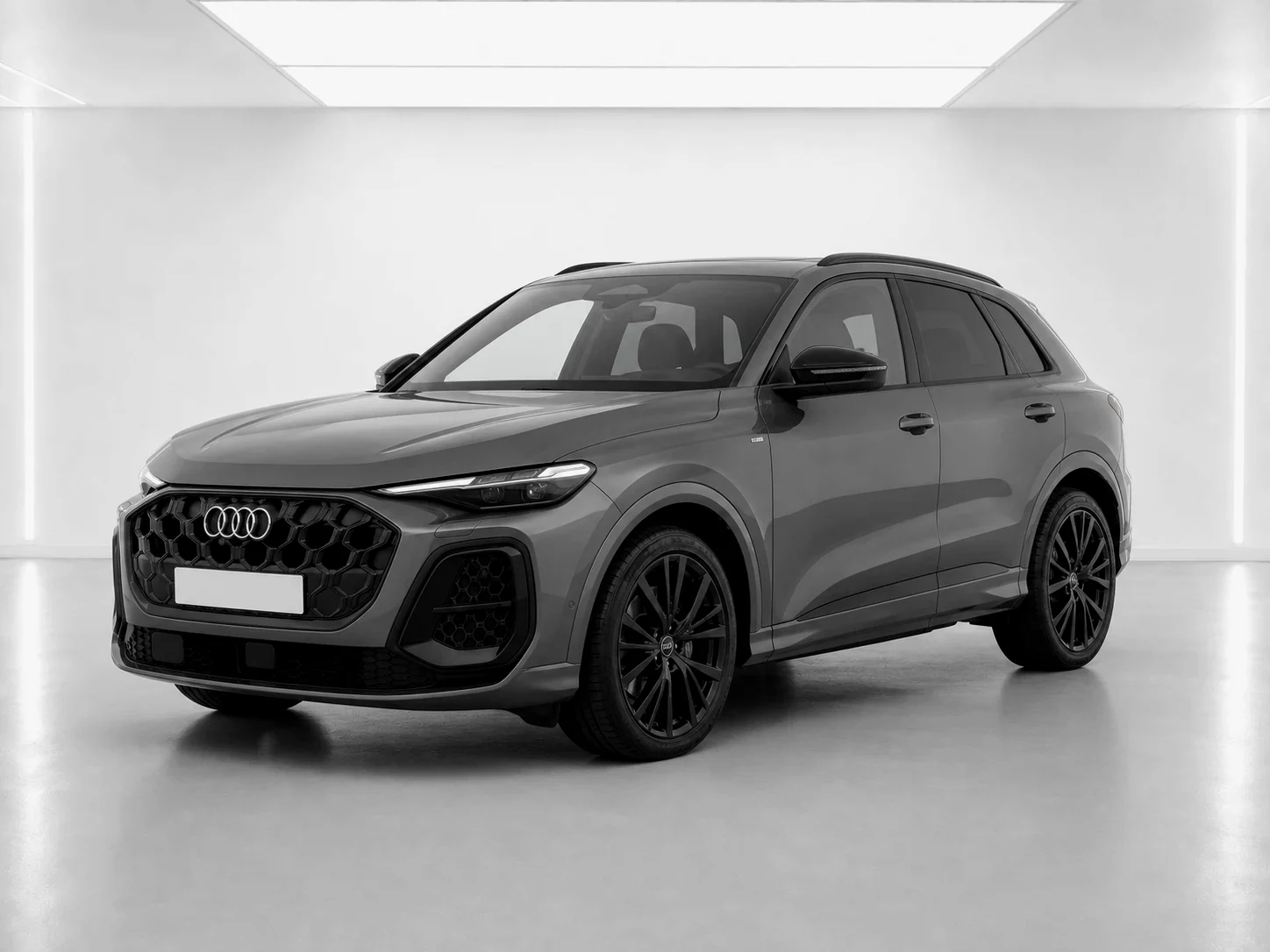 2026 Audi Q5 Black Edition e-hybrid in a white LED showroom