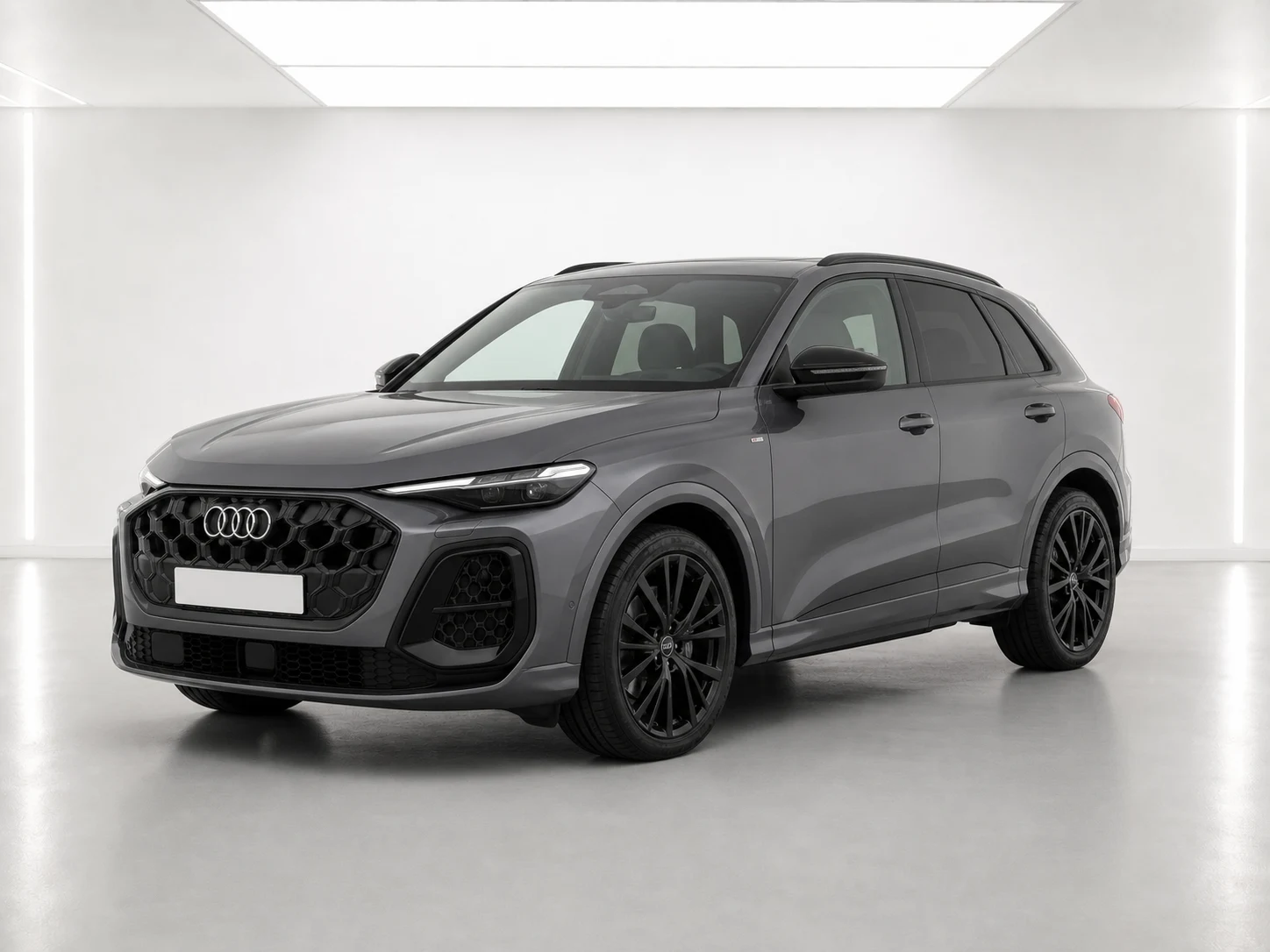 2026 Audi Q5 Black Edition e-hybrid in a white LED showroom