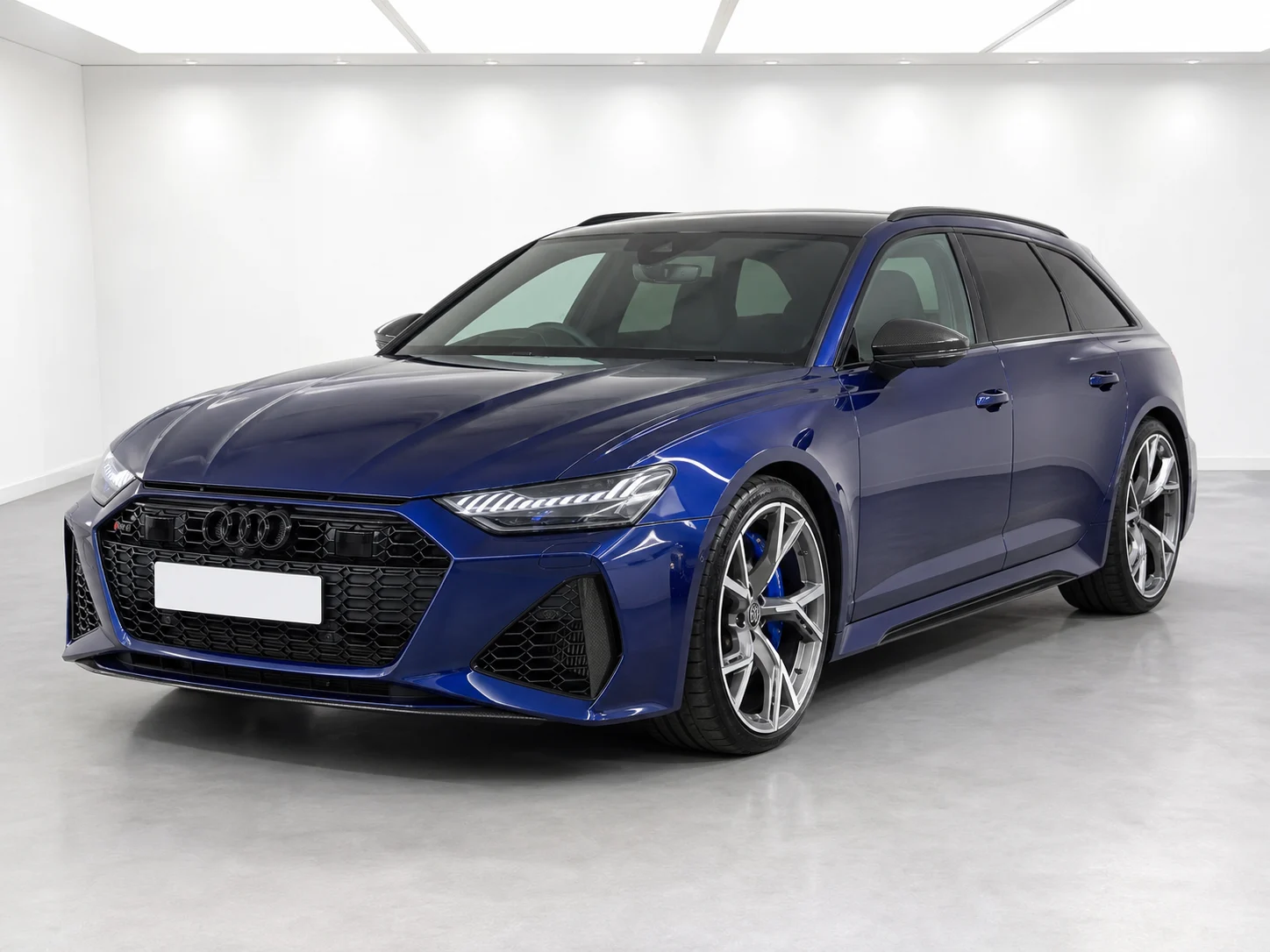 2026 Audi RS 6 Avant performance tiptronic in a white LED showroom