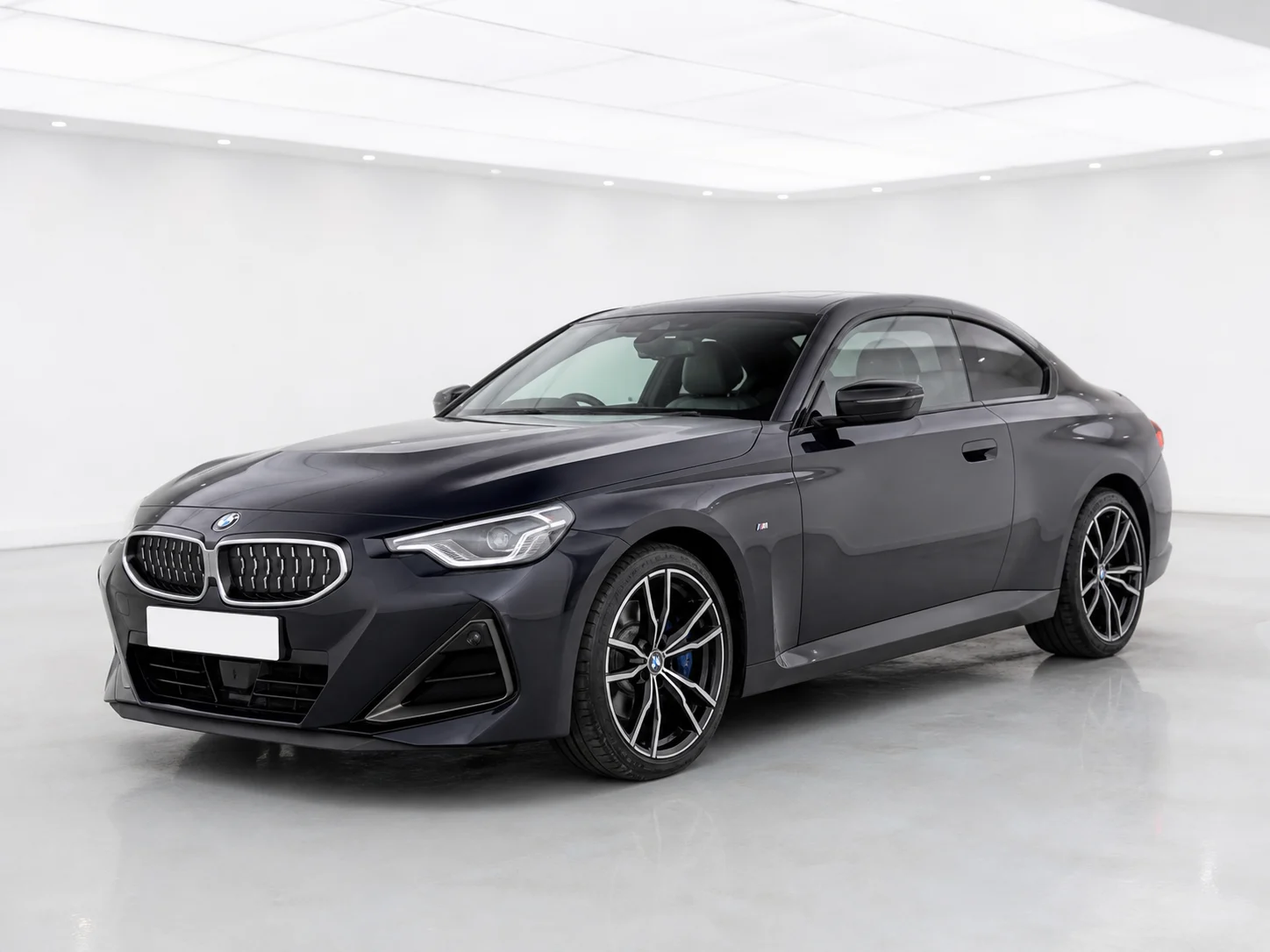 2026 BMW 2 Series Coupe 220i M Sport in a white LED showroom