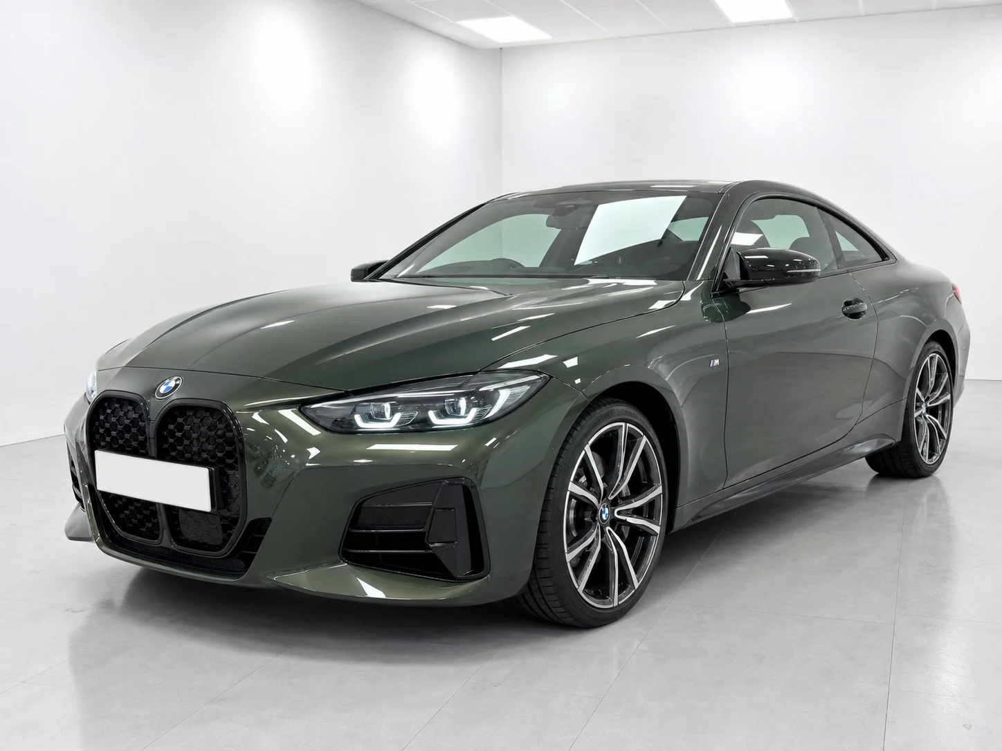 2026 BMW 4 Series Coupe 420i M Sport in a white LED showroom