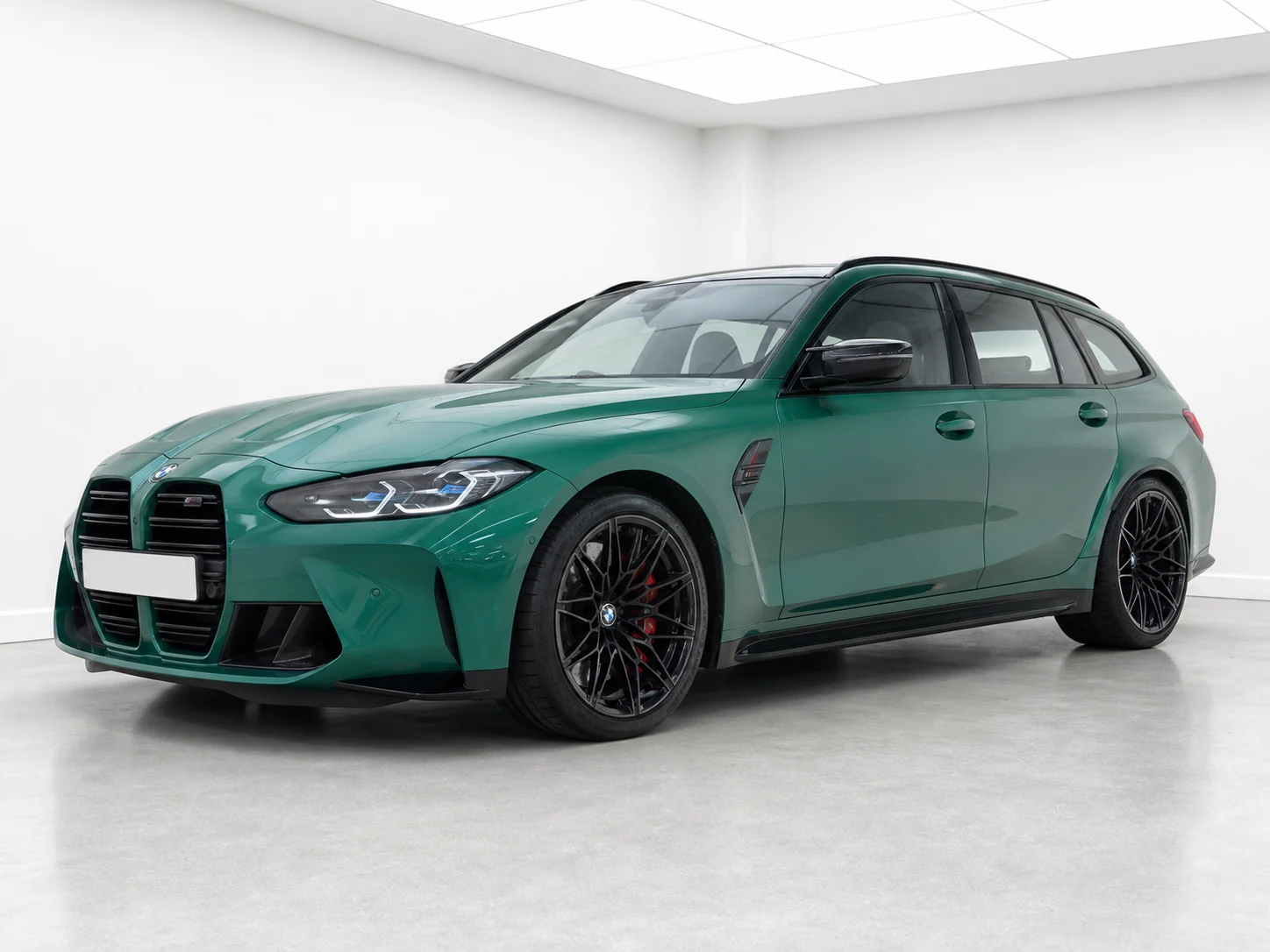 2026 BMW M3 Competition Touring xDrive M Steptronic in a white LED showroom