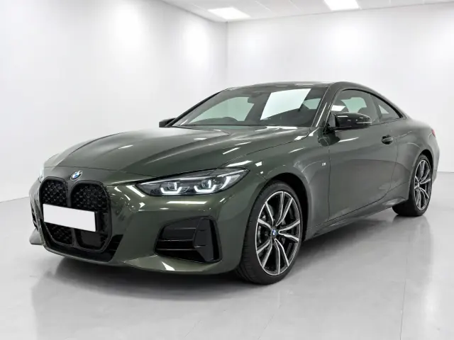 2026 BMW 4 Series Coupe 420i M Sport photographed from the front-left in the K-CARS showroom