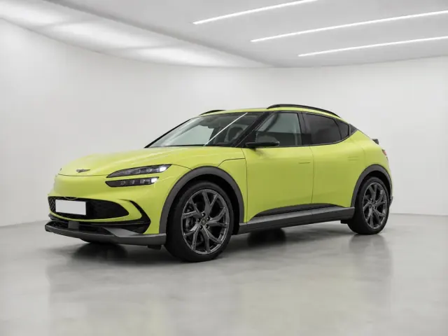 2025 Genesis GV60 Sport Plus photographed from the front-left in the K-CARS showroom