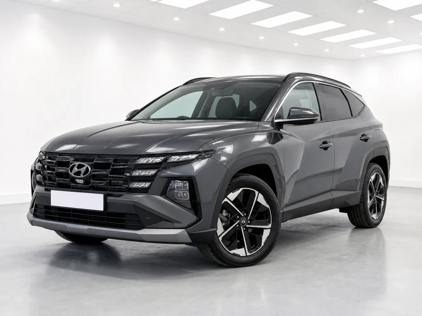 2026 Hyundai Tucson Ultimate Hybrid AWD in a white LED showroom