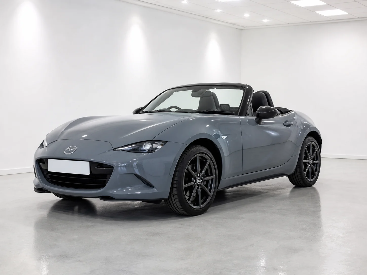 2026 Mazda MX-5 Homura Roadster in a white LED showroom
