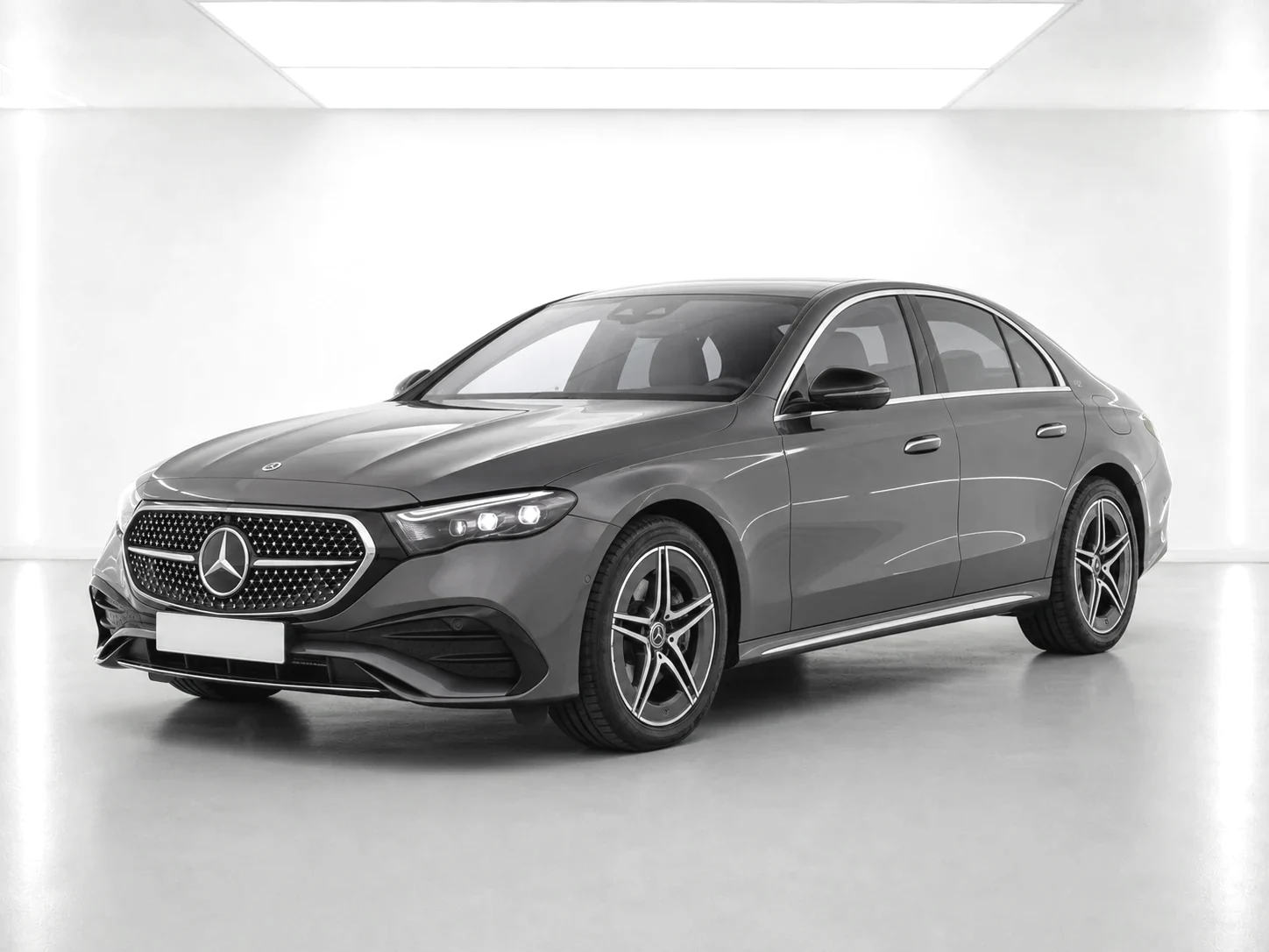 2026 Mercedes-Benz E-Class E 300 e AMG Line Premium 9G-TRONIC in a white LED showroom