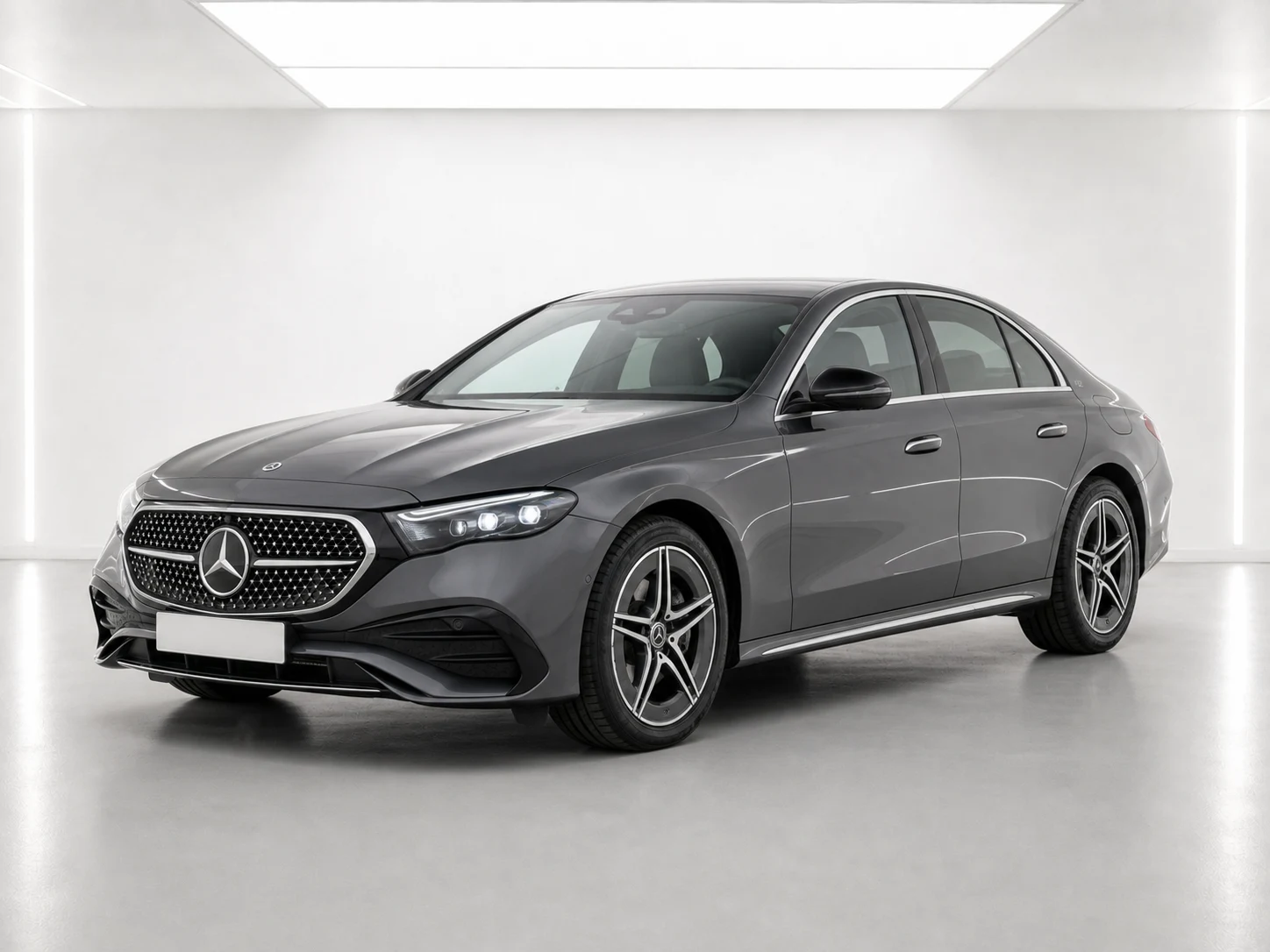 2026 Mercedes-Benz E-Class E 300 e AMG Line Premium 9G-TRONIC in a white LED showroom