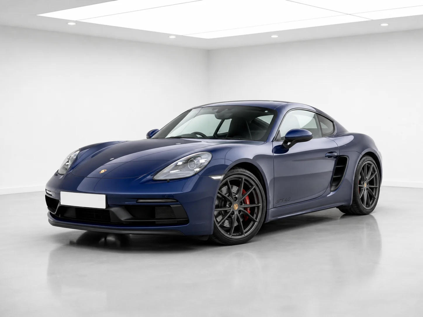 2026 Porsche 718 Cayman GTS 4.0 PDK in a white LED showroom