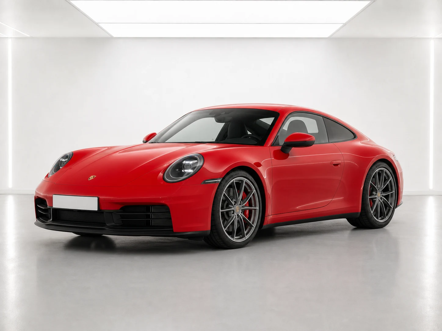 2026 Porsche 911 Carrera PDK in a white LED showroom