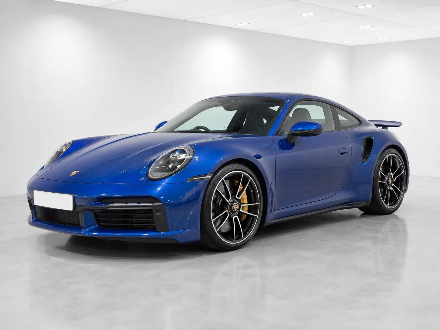 2026 Porsche 911 Turbo PDK in a white LED showroom