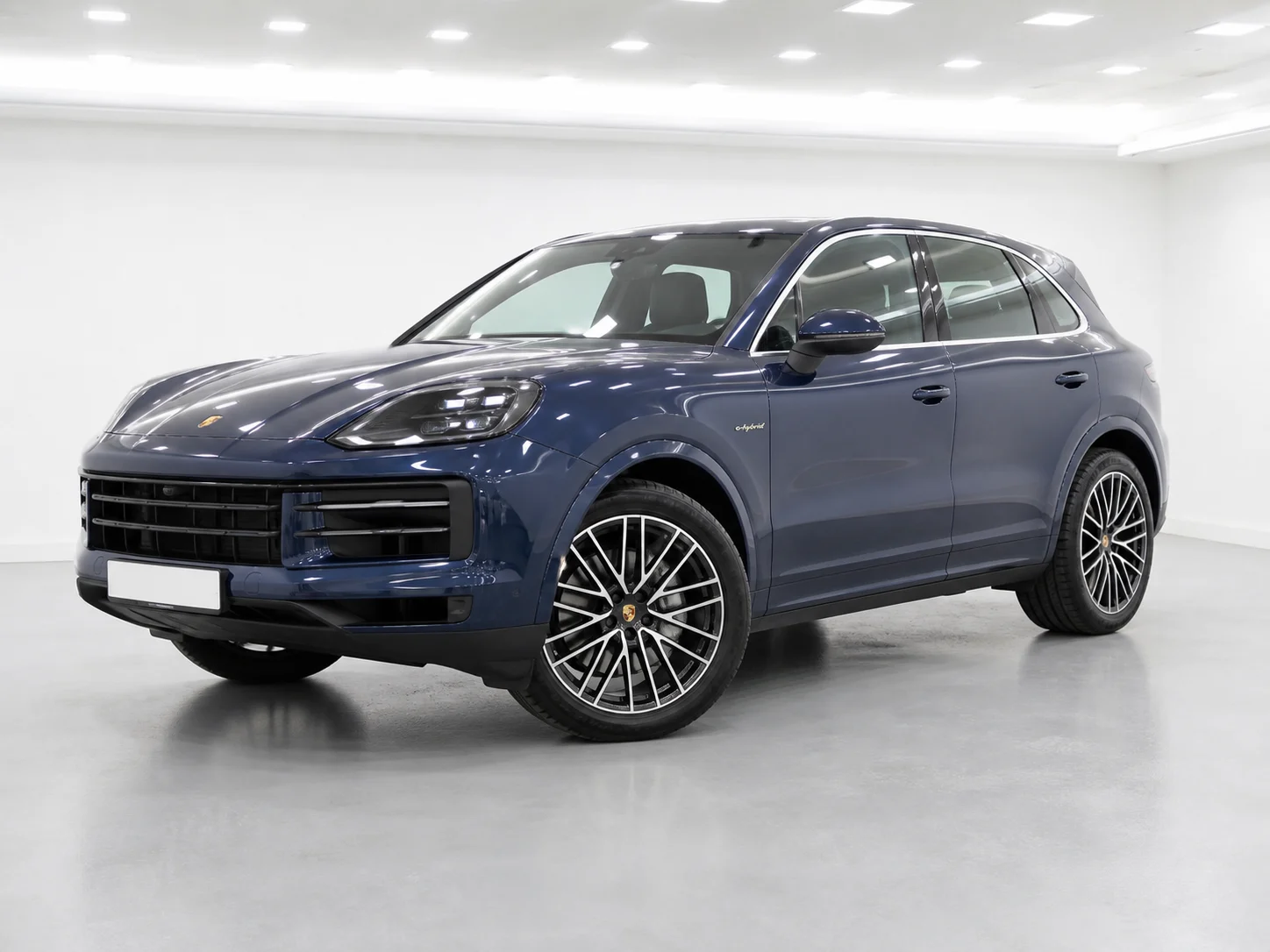 2026 Porsche Cayenne E-Hybrid Tiptronic S in a white LED showroom