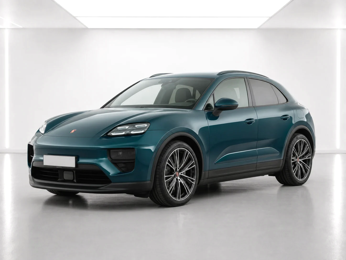 2026 Porsche Macan Macan 4 Electric in a white LED showroom