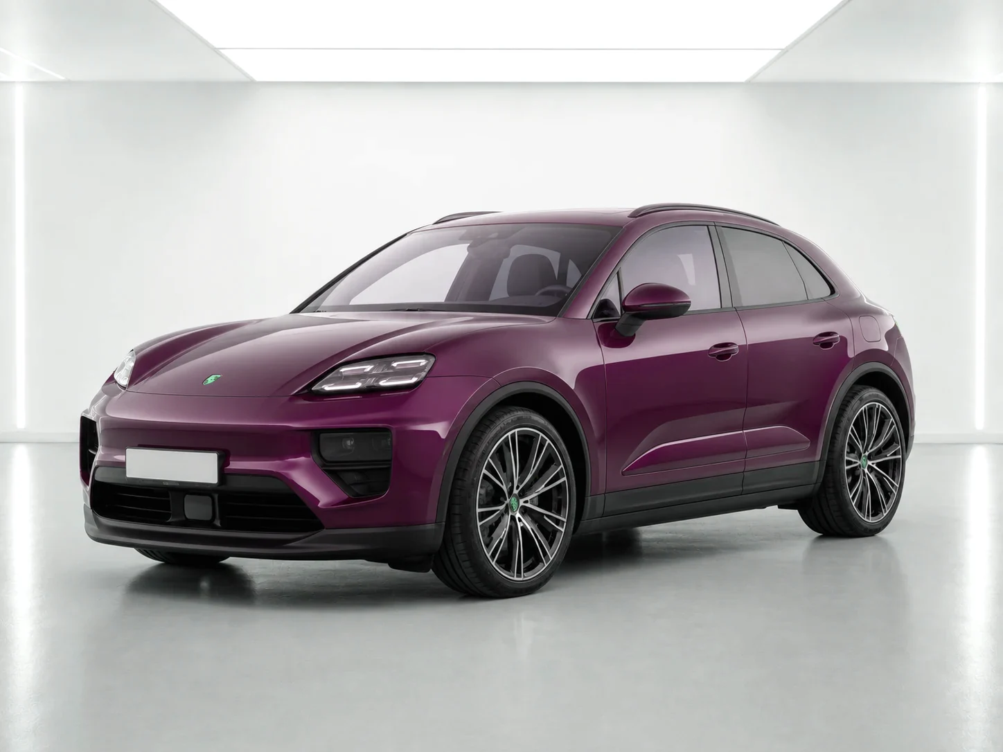 2026 Porsche Macan Macan 4 Electric in a white LED showroom
