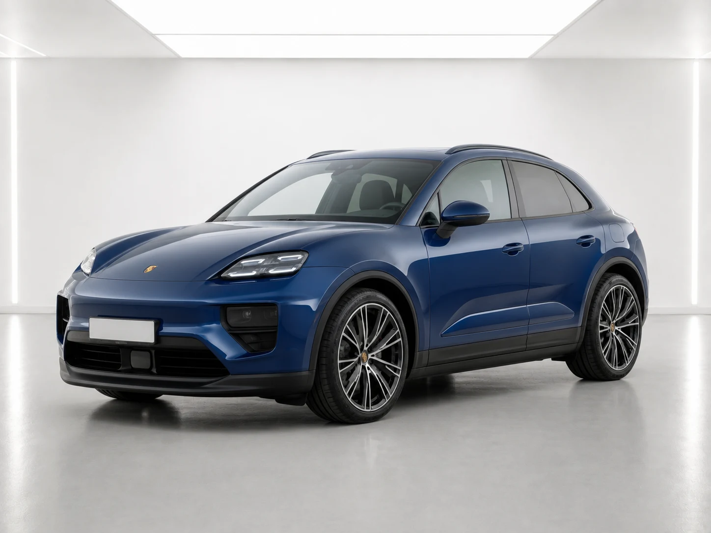 2026 Porsche Macan Macan 4 Electric in a white LED showroom