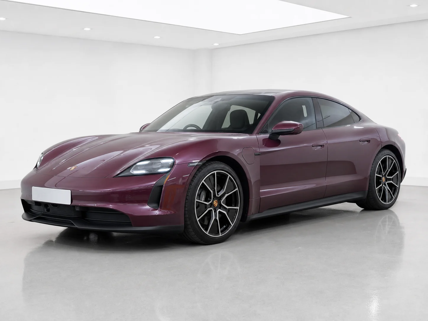 2026 Porsche Taycan 4S in a white LED showroom
