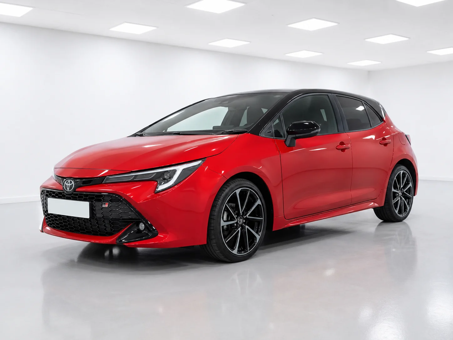 2026 Toyota Corolla Hatchback GR Sport Hybrid in a white LED showroom