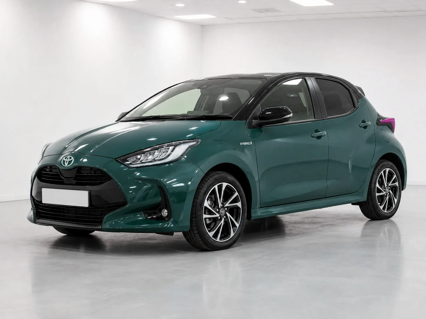 2026 Toyota Yaris Excel Hybrid in a white LED showroom