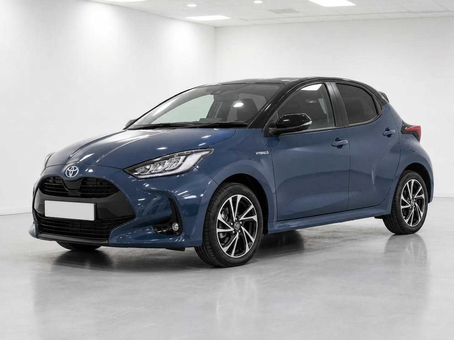 2026 Toyota Yaris Excel Hybrid in a white LED showroom