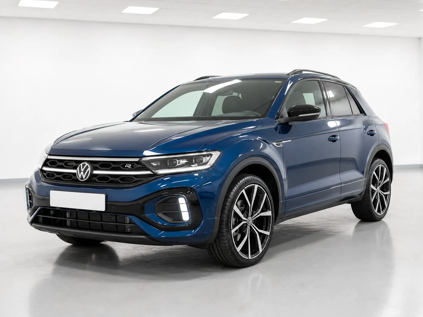 2026 Volkswagen T-Roc R-Line DSG in a white LED showroom