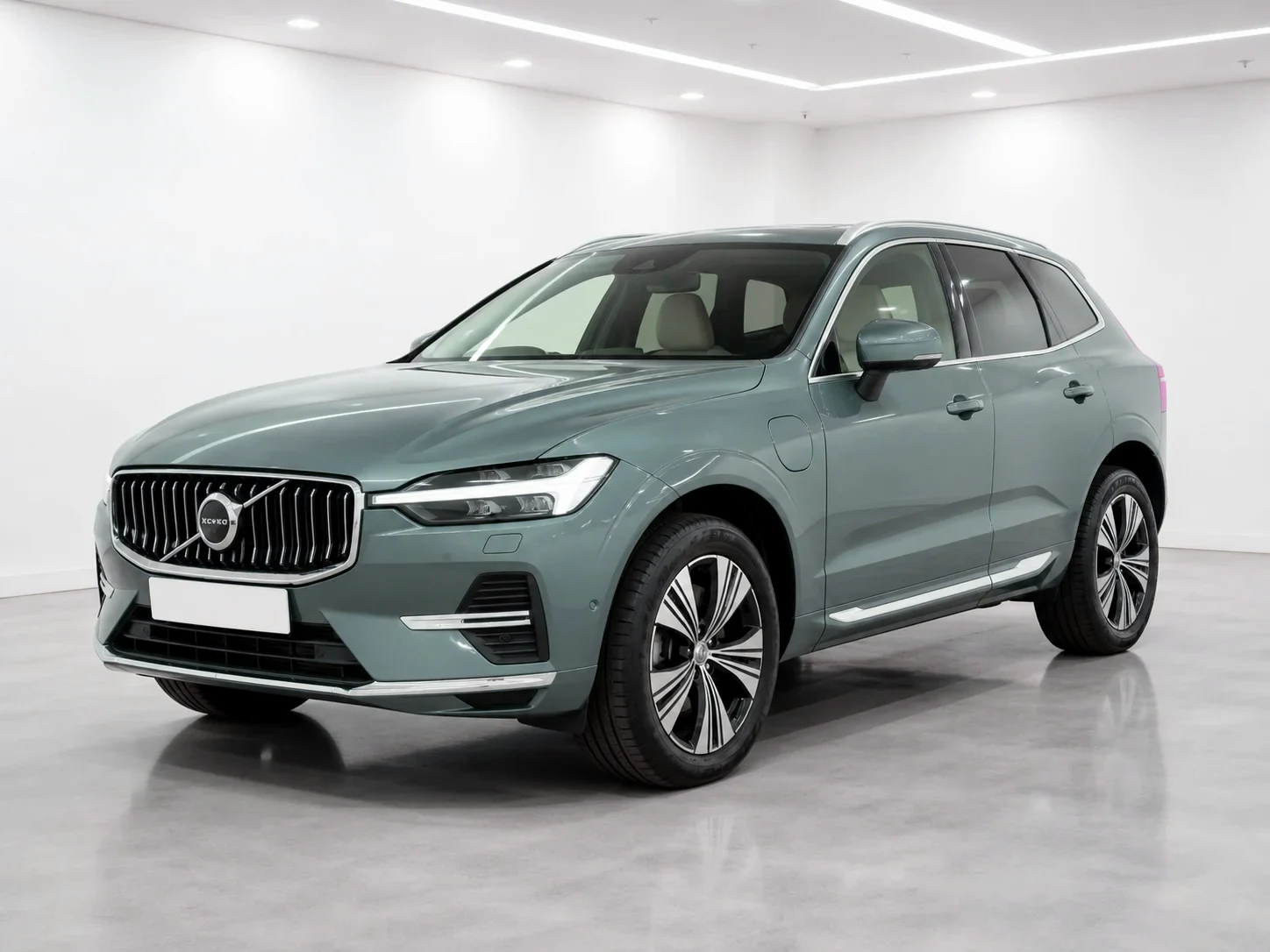 2026 Volvo XC60 T8 Plug-in Hybrid Ultra in a white LED showroom