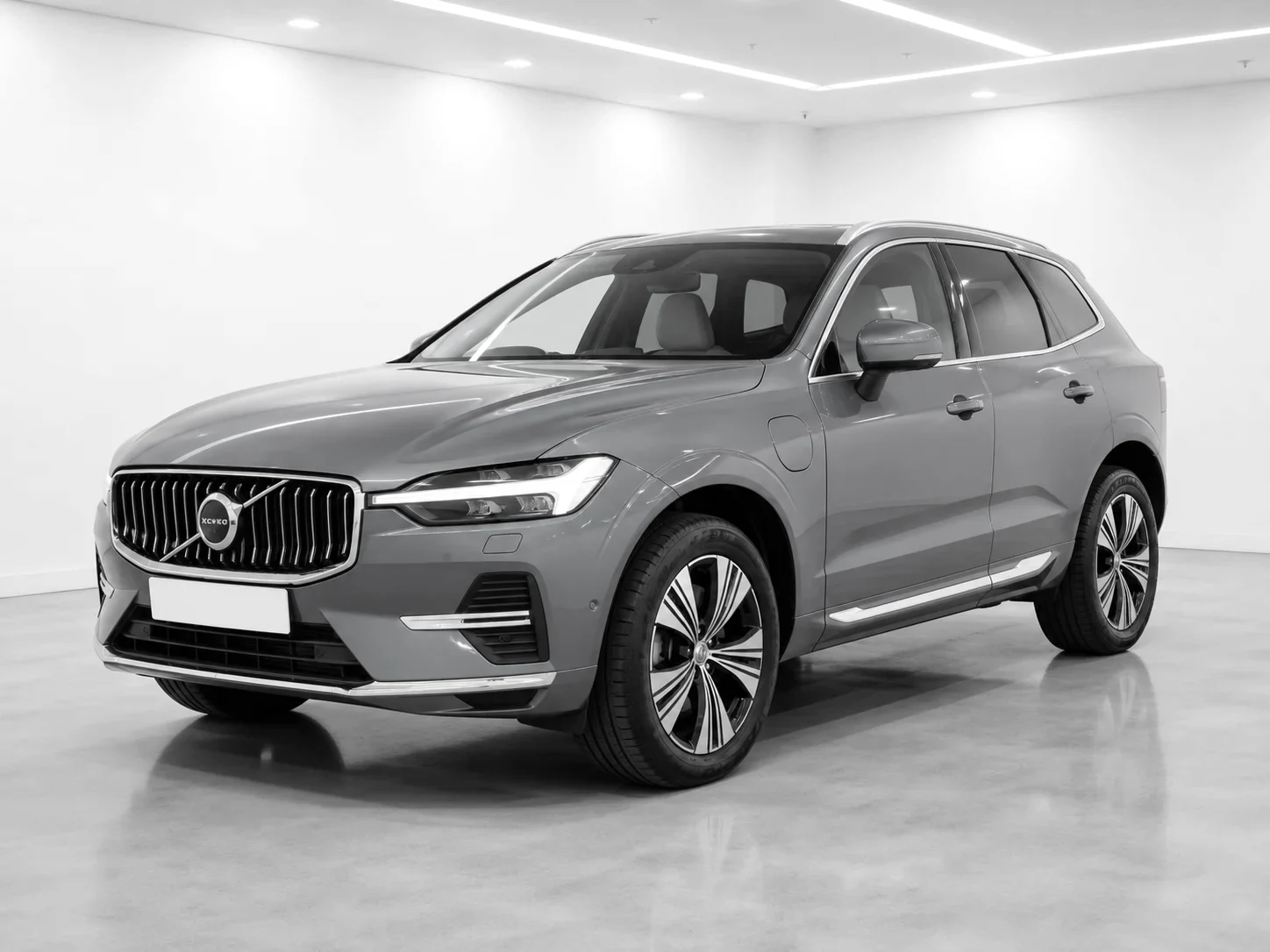 2026 Volvo XC60 T8 Plug-in Hybrid Ultra in a white LED showroom