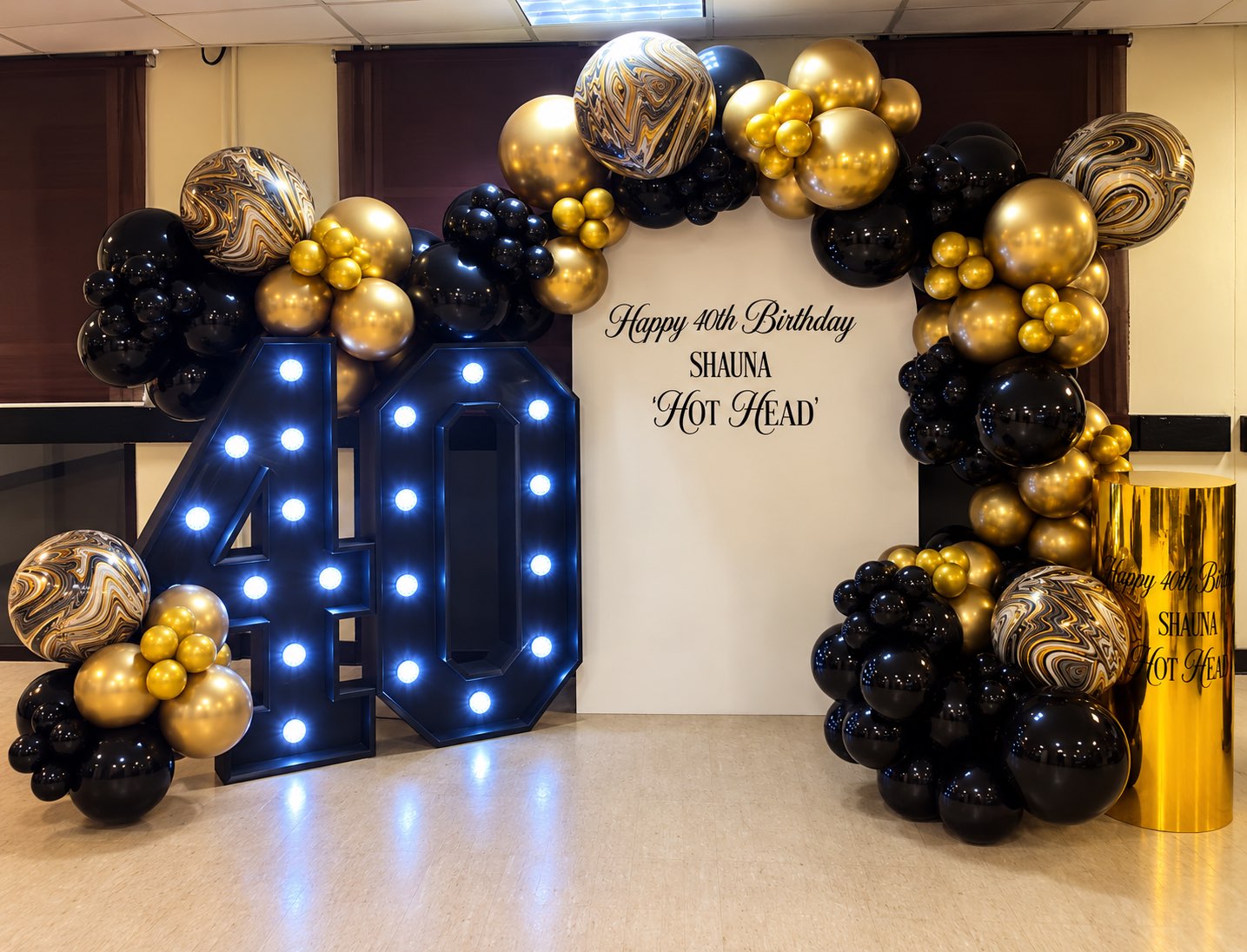 Black and gold 40th birthday display