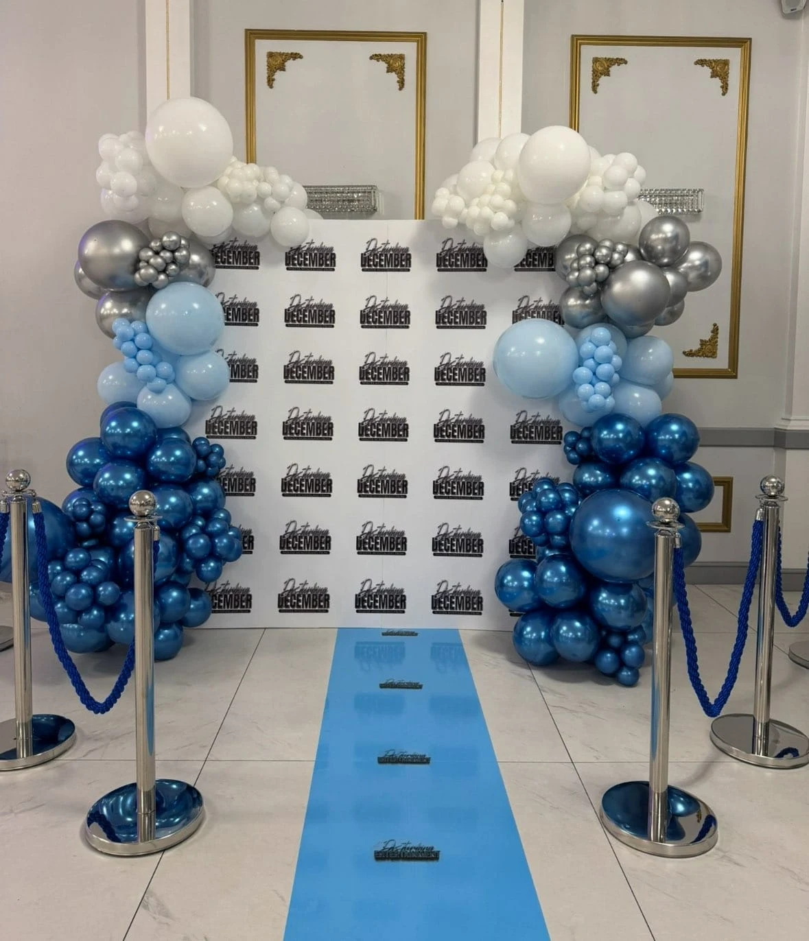 Blue carpet & balloon entrance